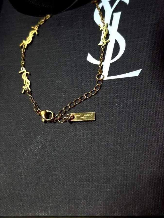 Золотий браслет Saint Laurent 3
