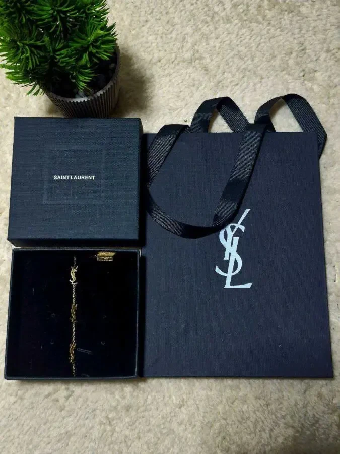 Золотий браслет Saint Laurent 2