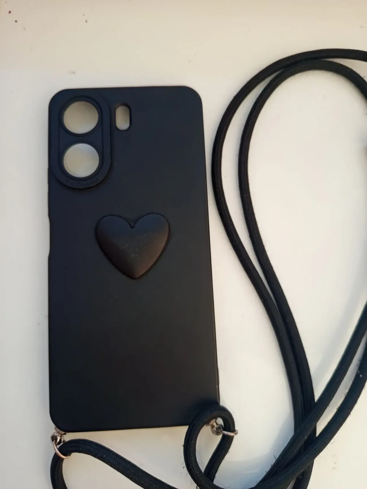 Це чохол для телефону з ремінце