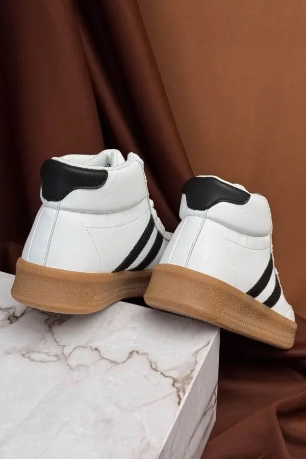 Стильні демісезонні кросівки Stilli у базовому біло-чорному кольорі 8