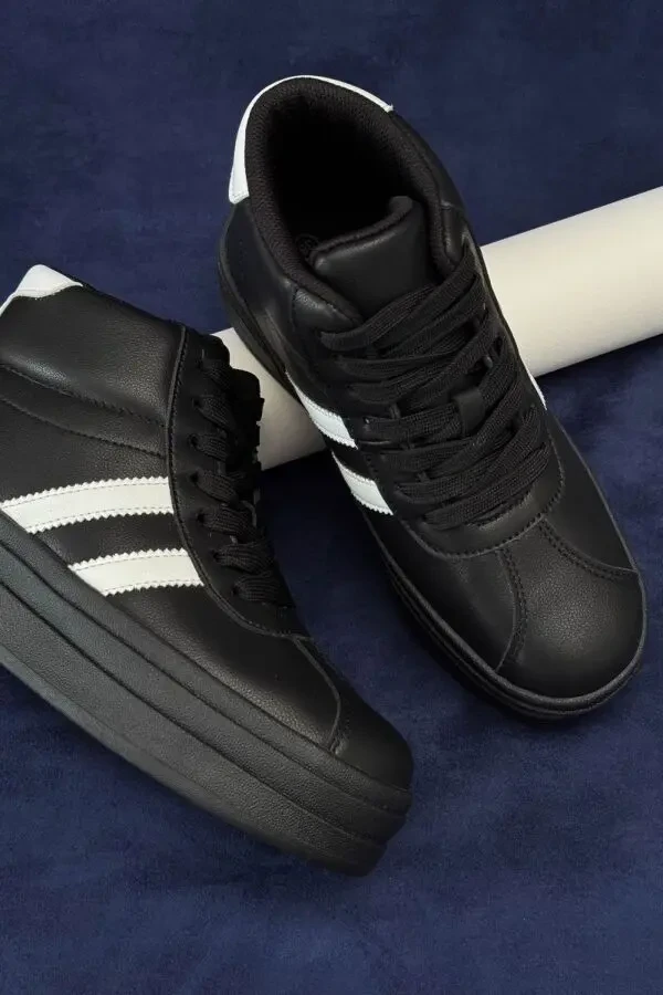 Стильні демісезонні кросівки Stilli у чорно-білому кольорі 2