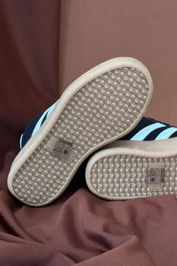 Стильні демісезонні кросівки Stilli у чорно-білому кольорі. 4