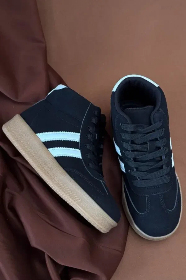 Стильні демісезонні кросівки Stilli у чорно-білому кольорі. 5