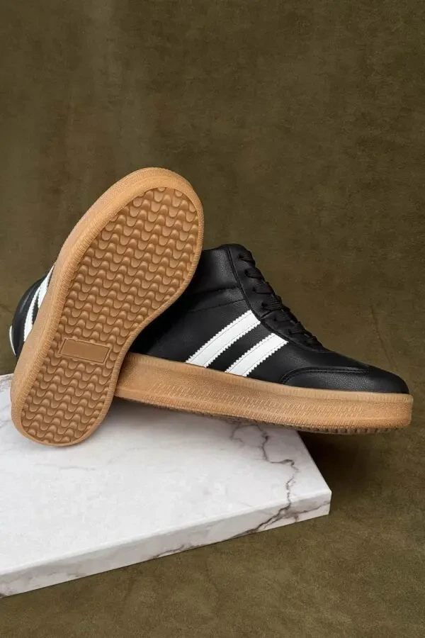 Стильні демісезонні кросівки Stilli у чорно-білому кольорі. 4