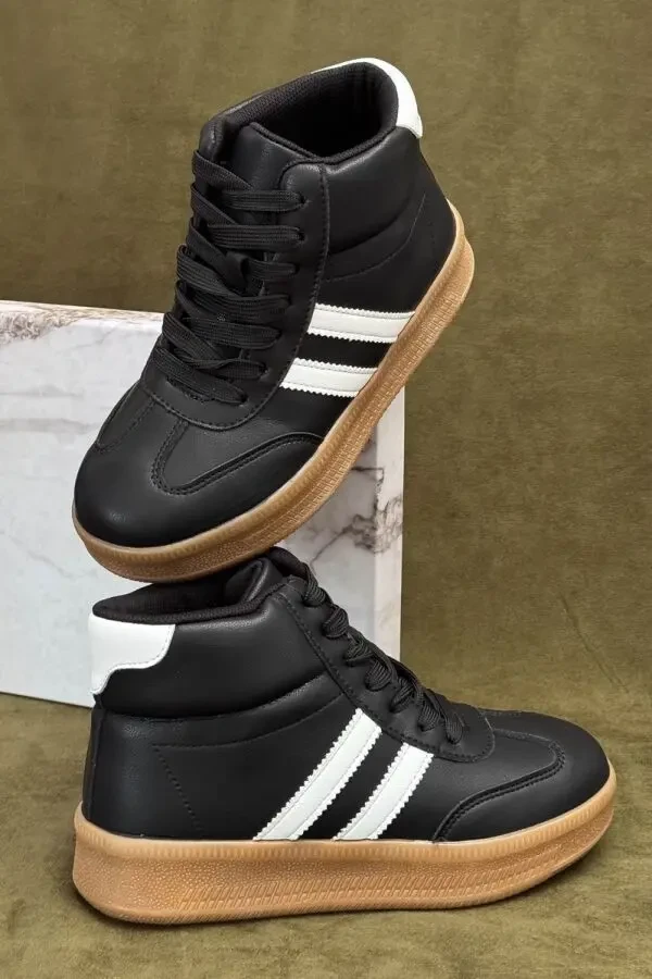 Стильні демісезонні кросівки Stilli у чорно-білому кольорі. 5