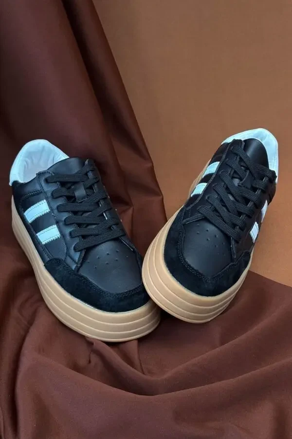 Стильні демісезонні кросівки Stilli у чорно-бежевому поєднанні.