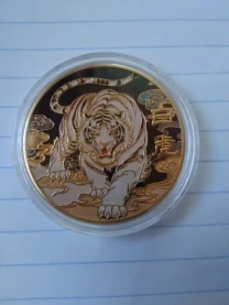 Монета тигр