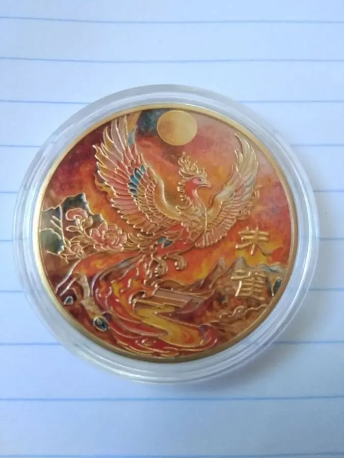 Монета фенікс