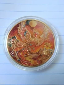 Монета фенікс