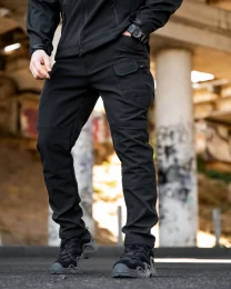 Чолові штани софтшел чорного кольору на флісі