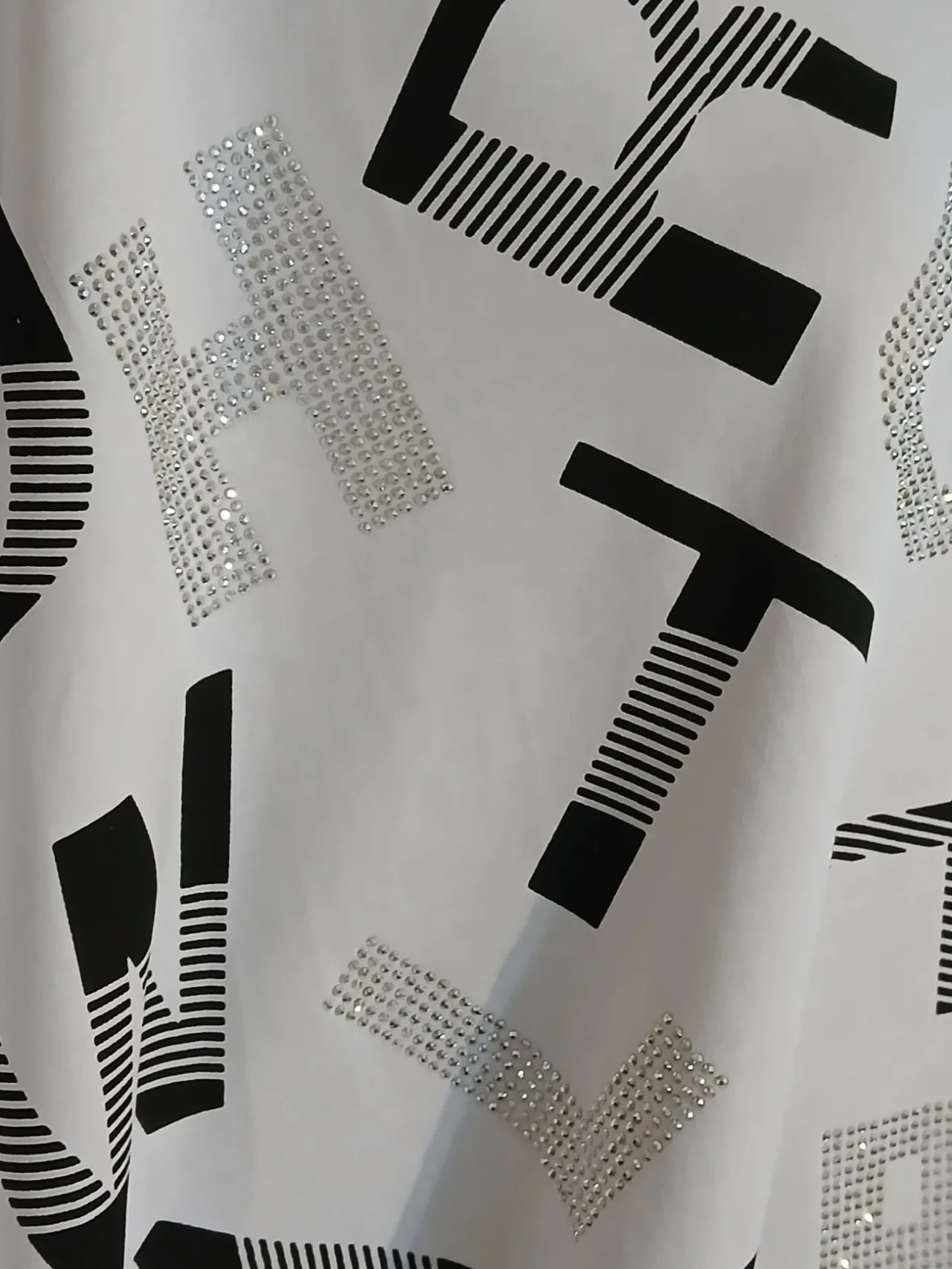 Туніка жіноча оверсайз із малюнком  газетка 4