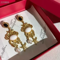 Сережки Schiaparellli