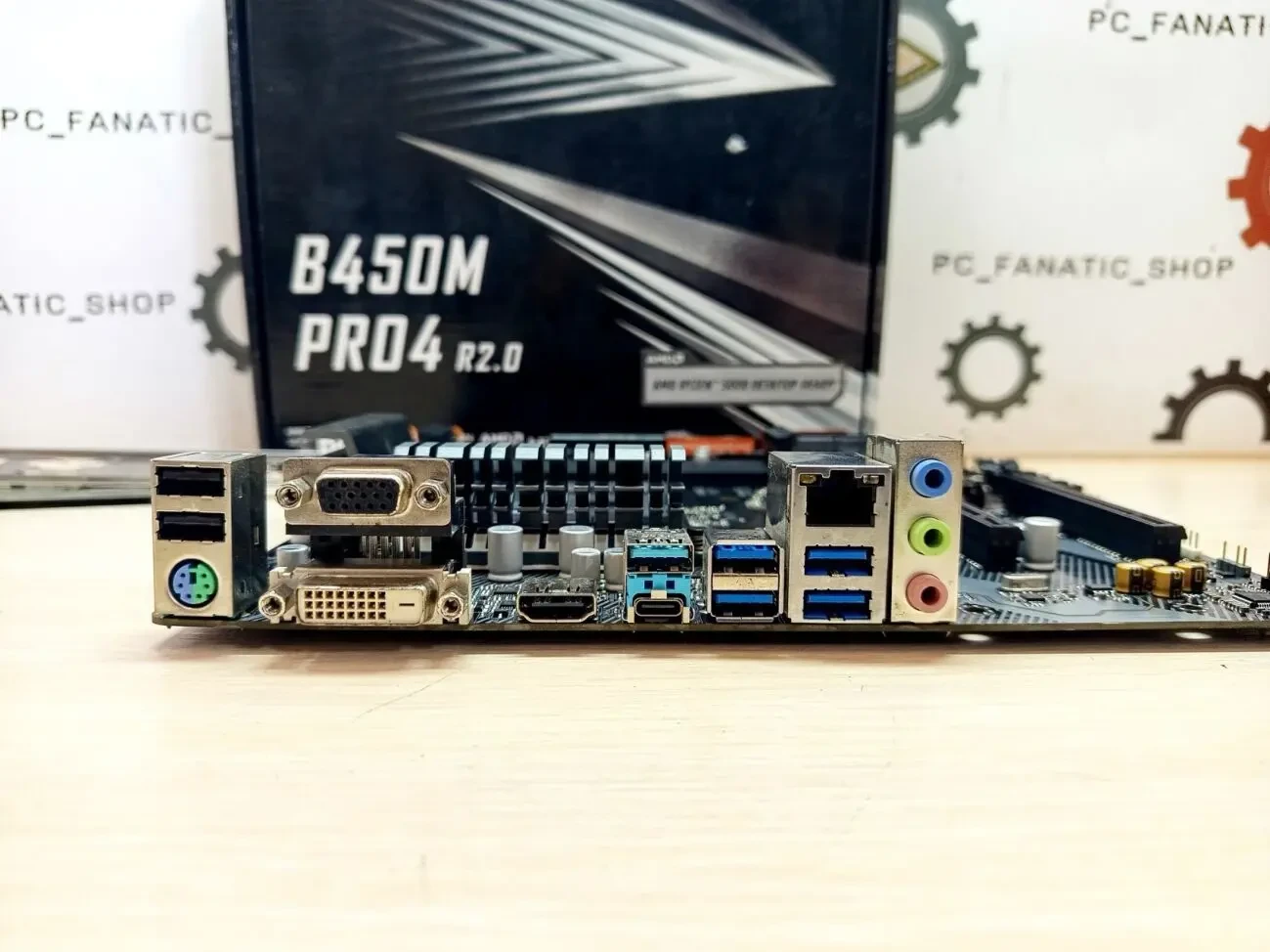 Материнська плата ASRock B450M Pro4 R2.0 (sAM4, AMD B450, PCI-Ex16) 3