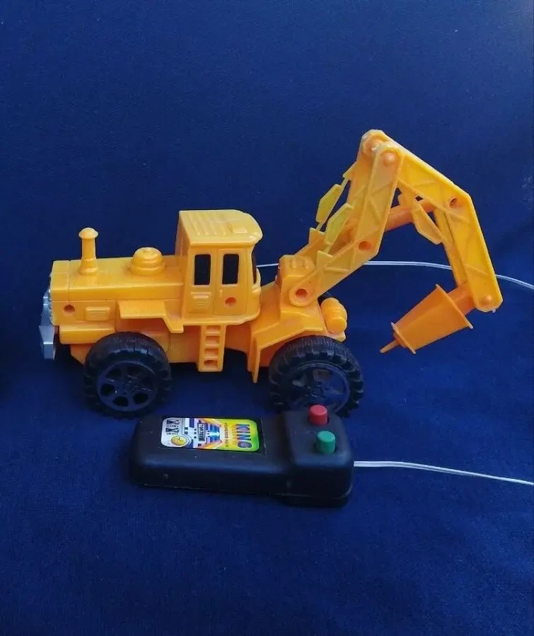 Іграшковий екскаватор на пульті керування для дітей 2
