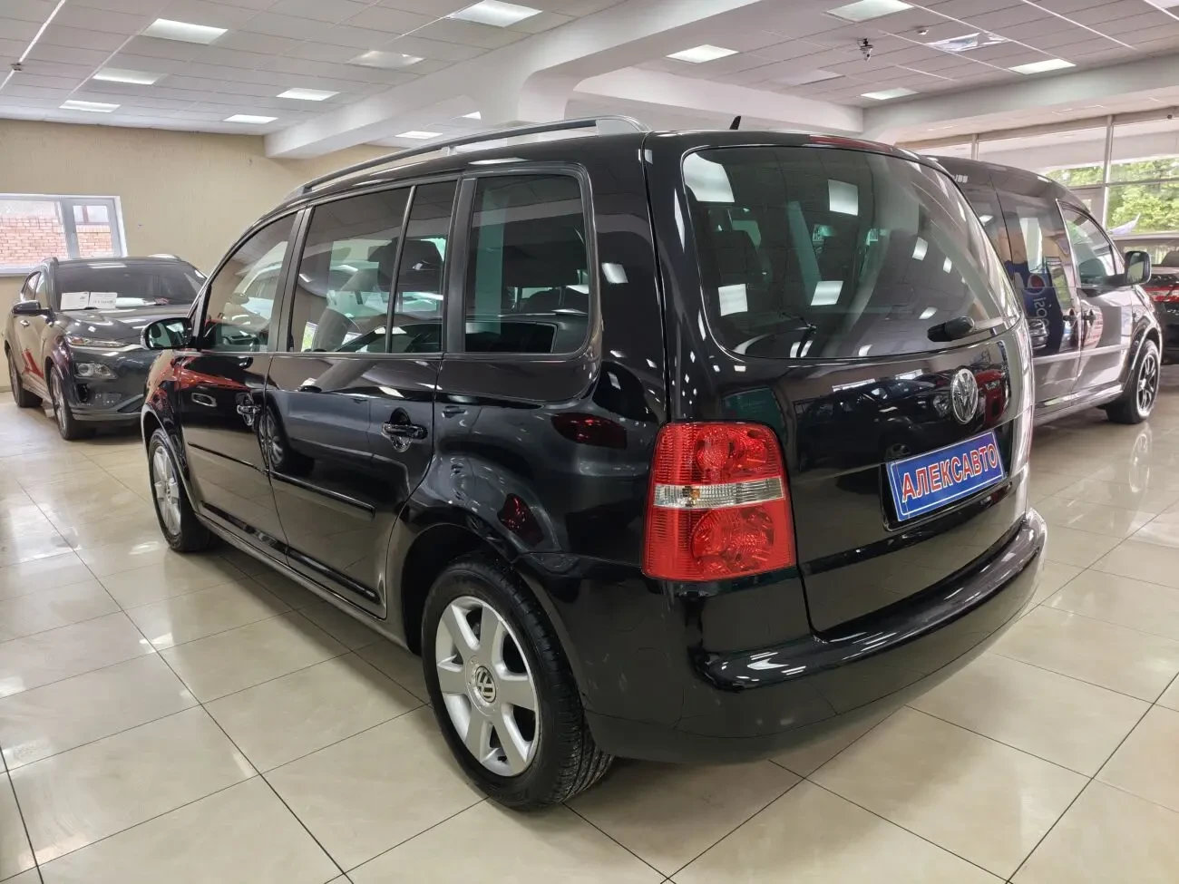 Volkswagen Touran 1.6МРі 8V 5МКПП 2006 р.в. (102 к.с.), 7 місць 4