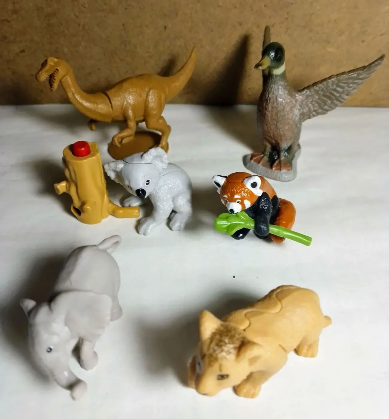 Игрушка утка, коала, рыжая панда, слон, динозавр, львенок фигурка мини статуэтка 6 штук