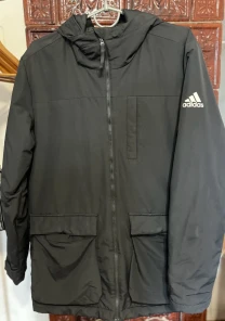 Продаж зимової чоловічої куртки Adidas.