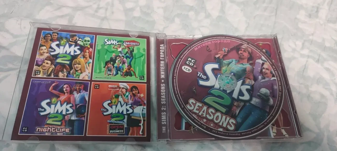 CD-бокс с игрой The Sims 2: Seasons 4