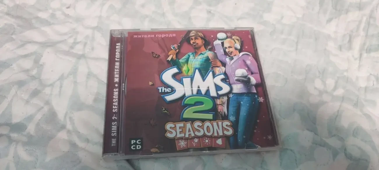 CD-бокс с игрой The Sims 2: Seasons 3