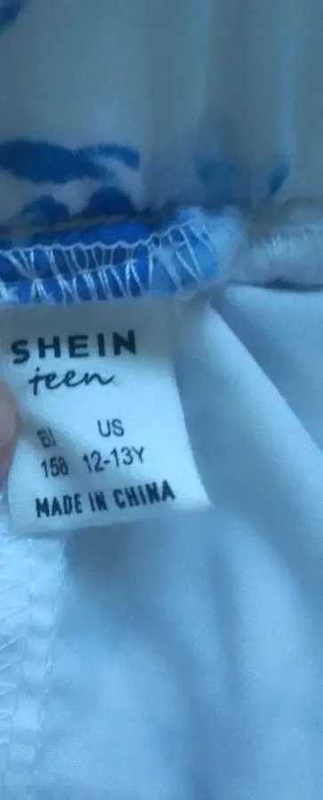 Жіноча розкльошена спідниця міді Shein р.42-44. 6