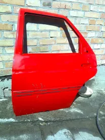 Дверь задняя левая 6871838 Форд Єскорт 91-95г.в. хетчбек,седан