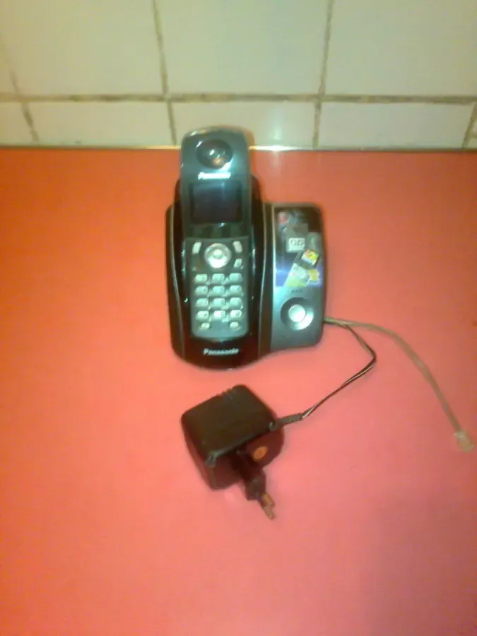 кнопочный телефон.