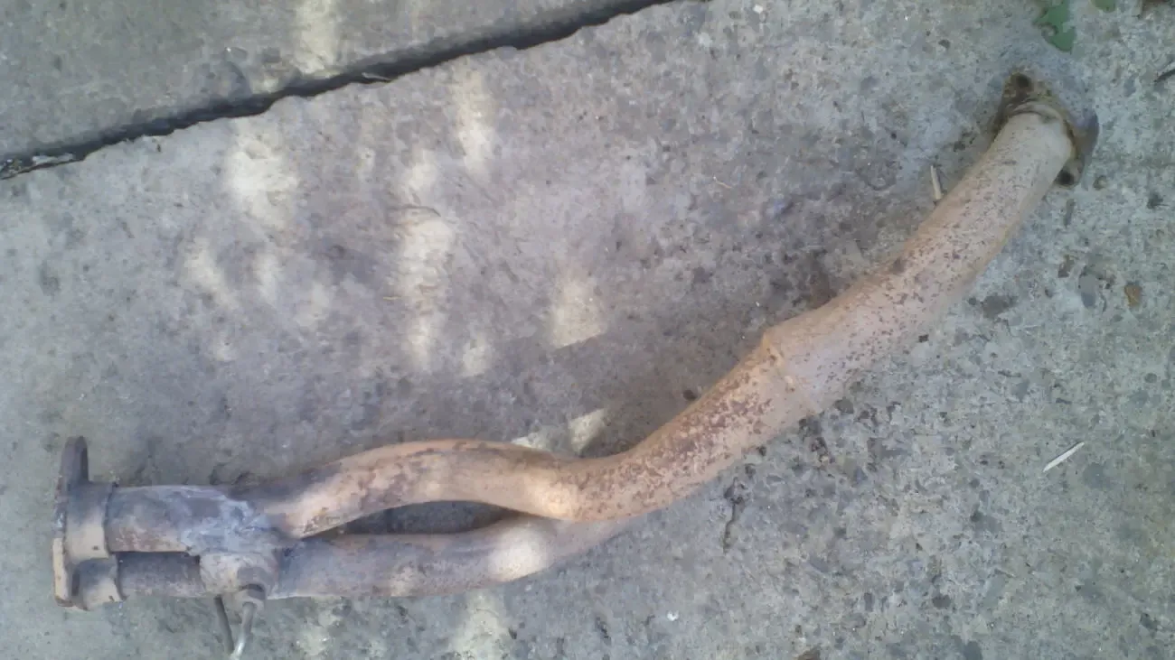 Приемная труба Форд Сиерра 2.0 онс 89г.в. инжектор оригинал штаны 2