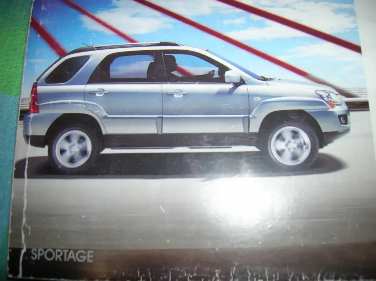 Дверь КИА-Спортейдж 2009года с накладками 5