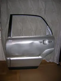 Дверь КИА-Спортейдж 2009года с накладками