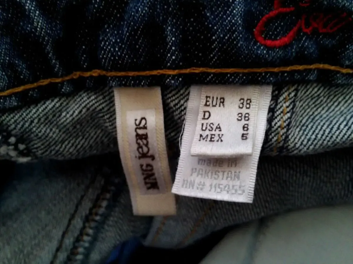 Потёртые расклешённые джинсы 8