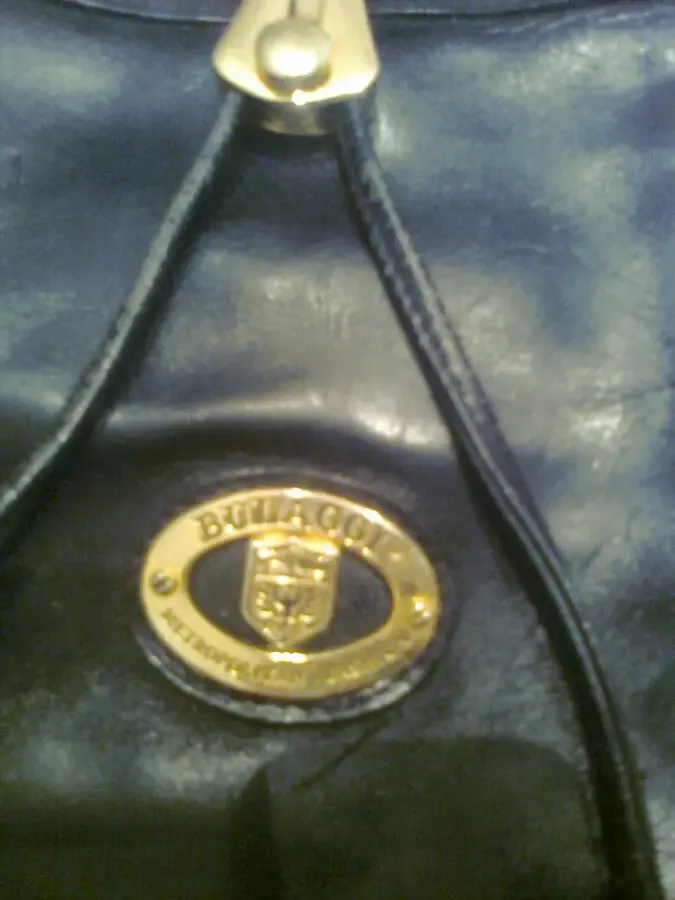 Черная сумка из искусственной кожи с красивыми аксессуарами.ГОЛЛАНДИЯ 8