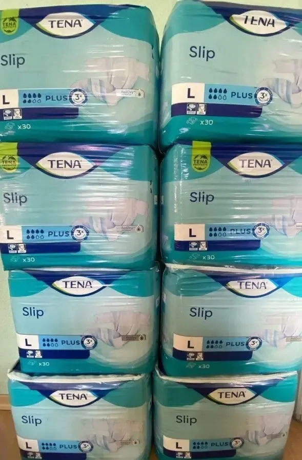 памперсы  TENA MAXI 8 капель 700гр . L\  SLIP 6 капель L600гр 2