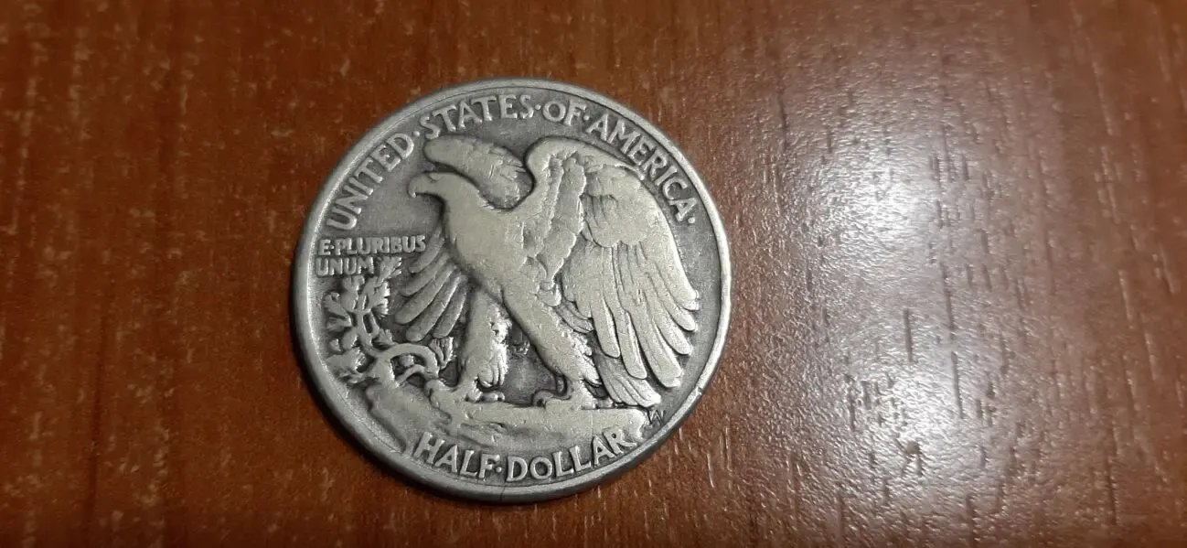 2 монеты по пол доллара США . Серебро