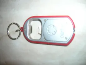 Брелок на ключи с фонариком и консерво-открывателем