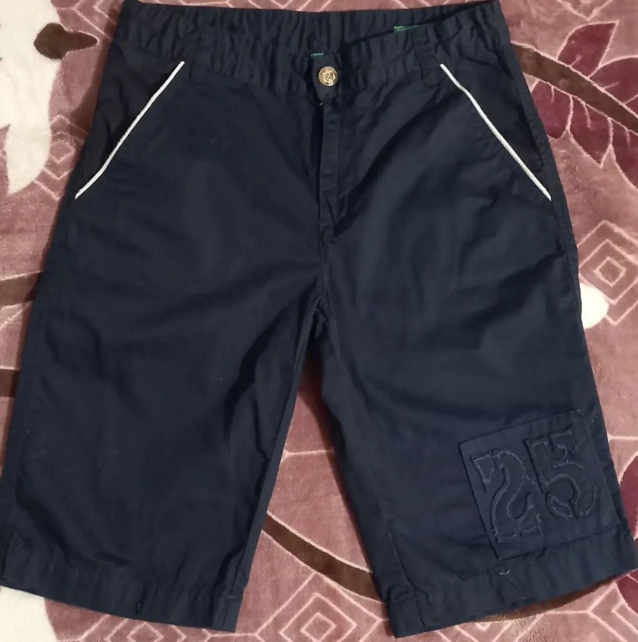 Новые шорты мальчику Benetton.