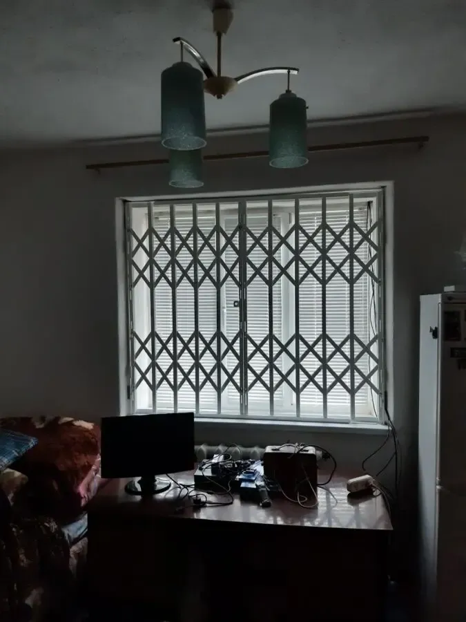 Днепр раздвижные металлические решетки на окна, двери, витрины. 3