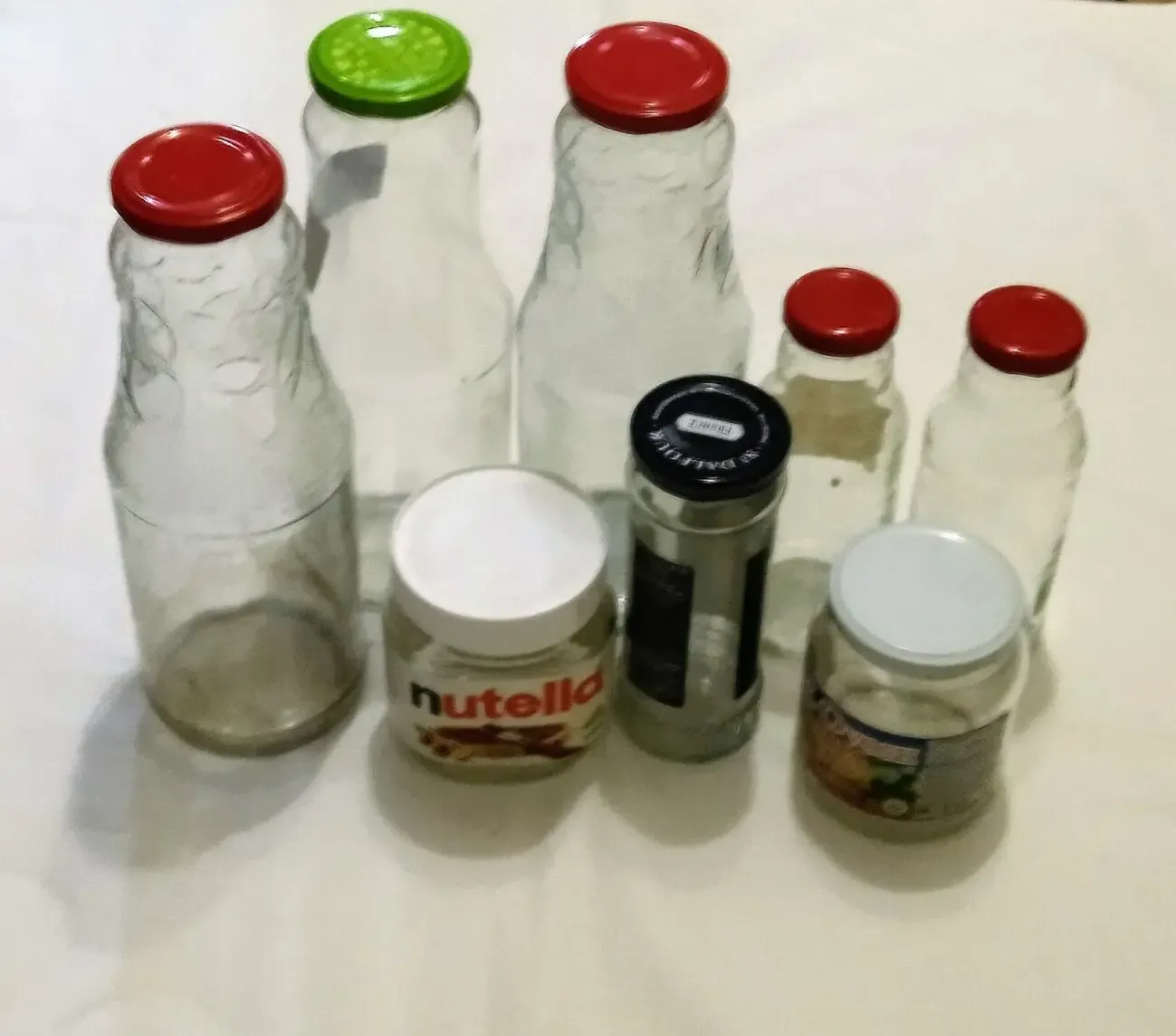 Продам банки с закручивающимися крышками и под ключ  стекло . Ёмкость 7