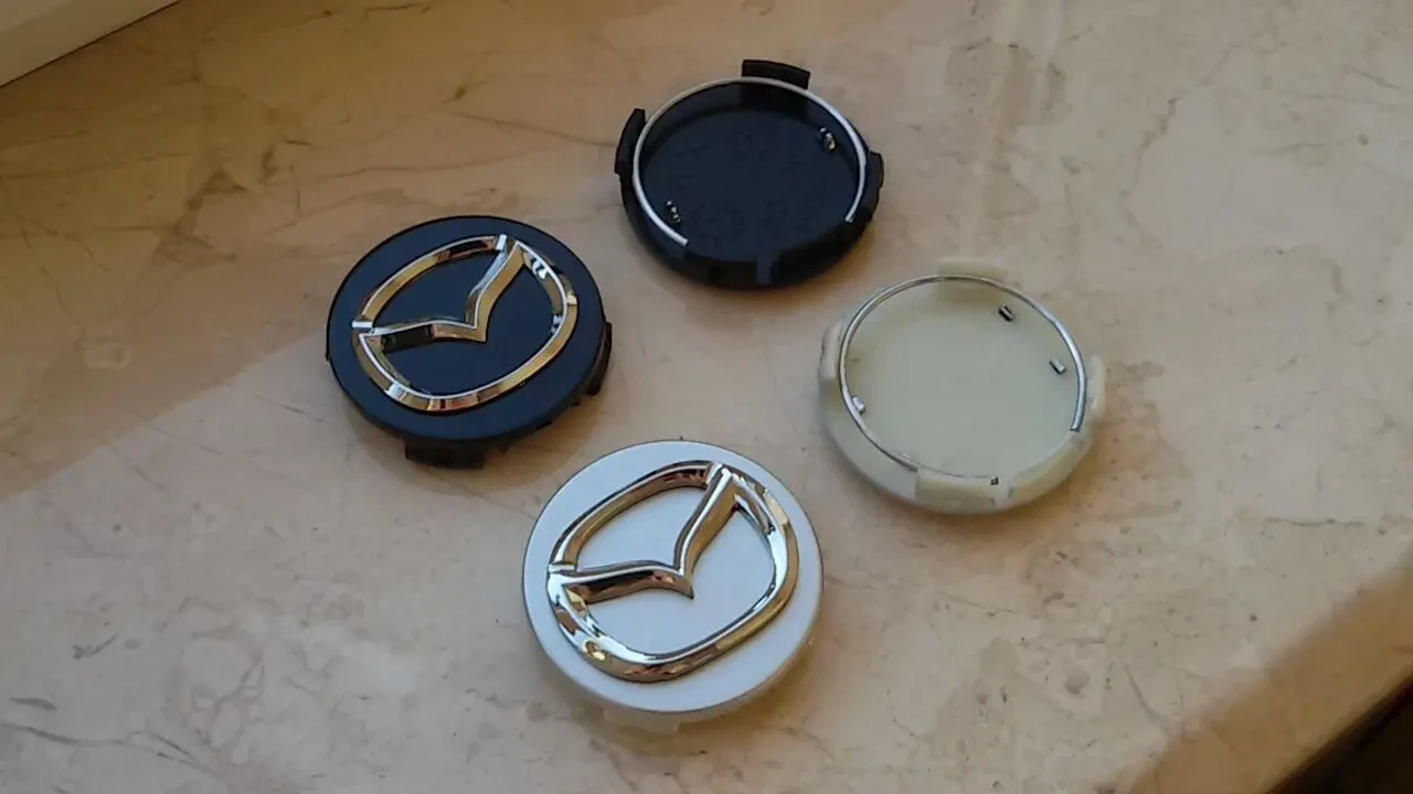 Колпачки в диски (заглушки в диски) Mazda Мазда 4